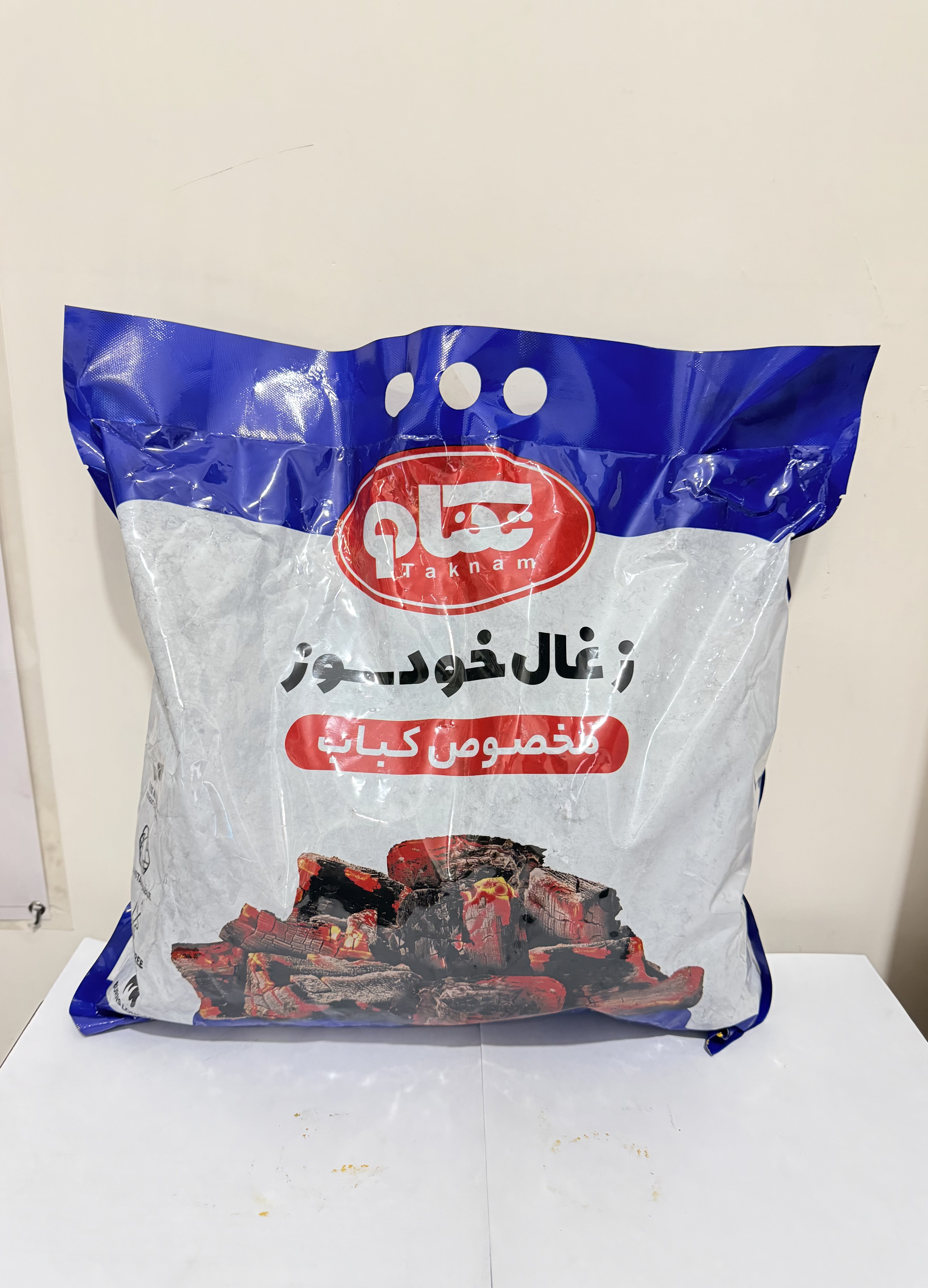 زغال کبابی خودسوز یک کیلویی تکنام/بسته ۱۲ عددی